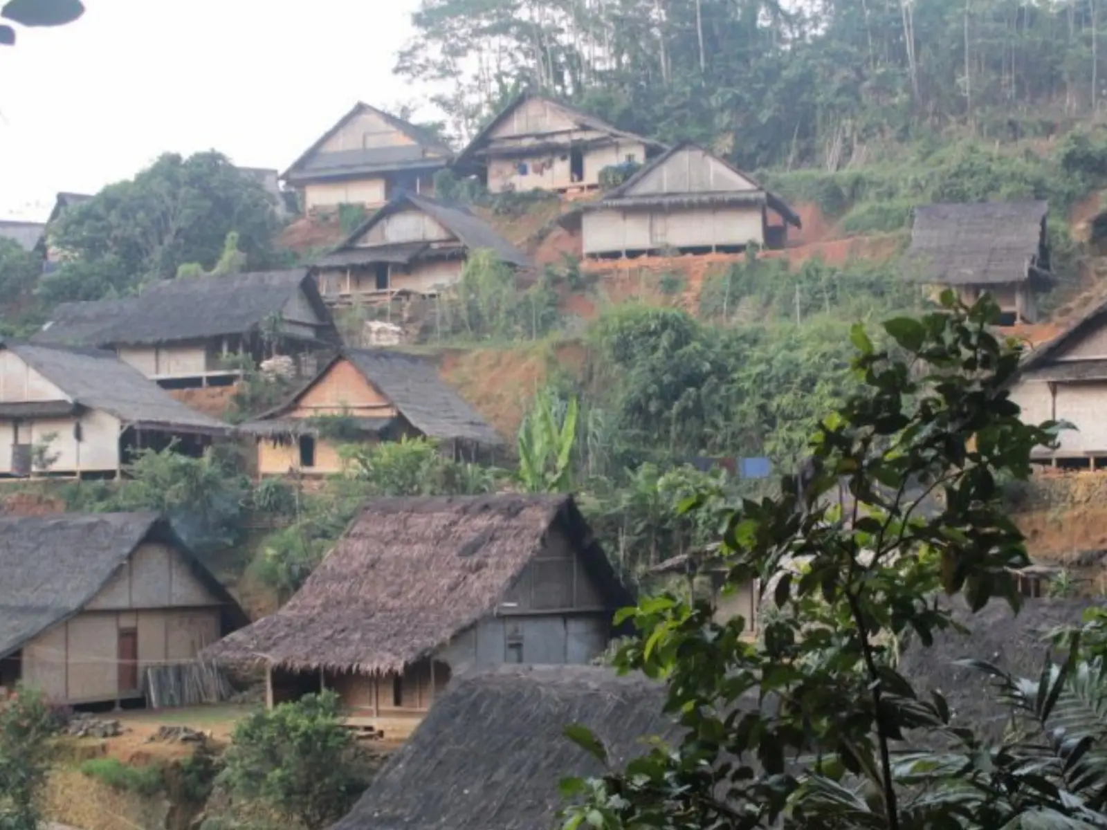 Baduy Luar village houses arranged along the hillside