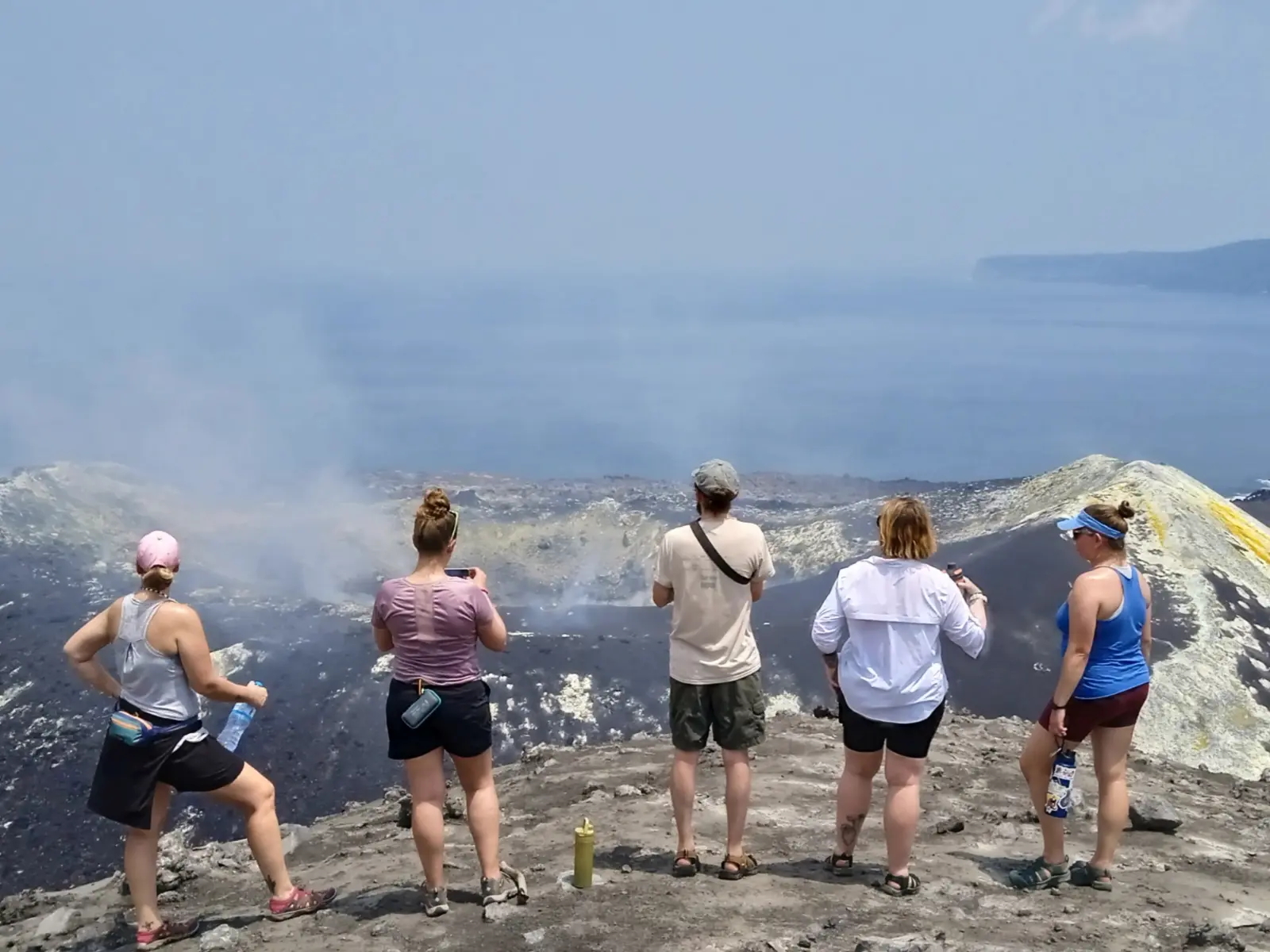 Private trip participants at the crater of Mount Anak Krakatau